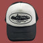 Cortiez Bold Black Oval Ship Logo Trucker Hat - White