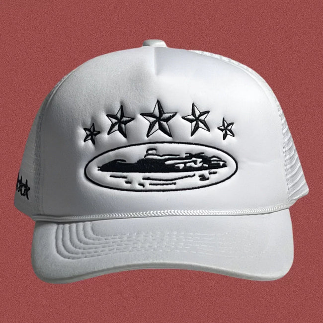 Corteiz Vintage White Trucker Hat with Black Stars and Cruise Ship Graphic Hover Image